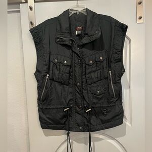 Vintage black oversized puffy style biker cinched waist vest. Lots of pockets!